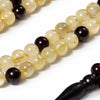 The InterMix Golden Rutilated With Garnet 8MM 100 Beads.